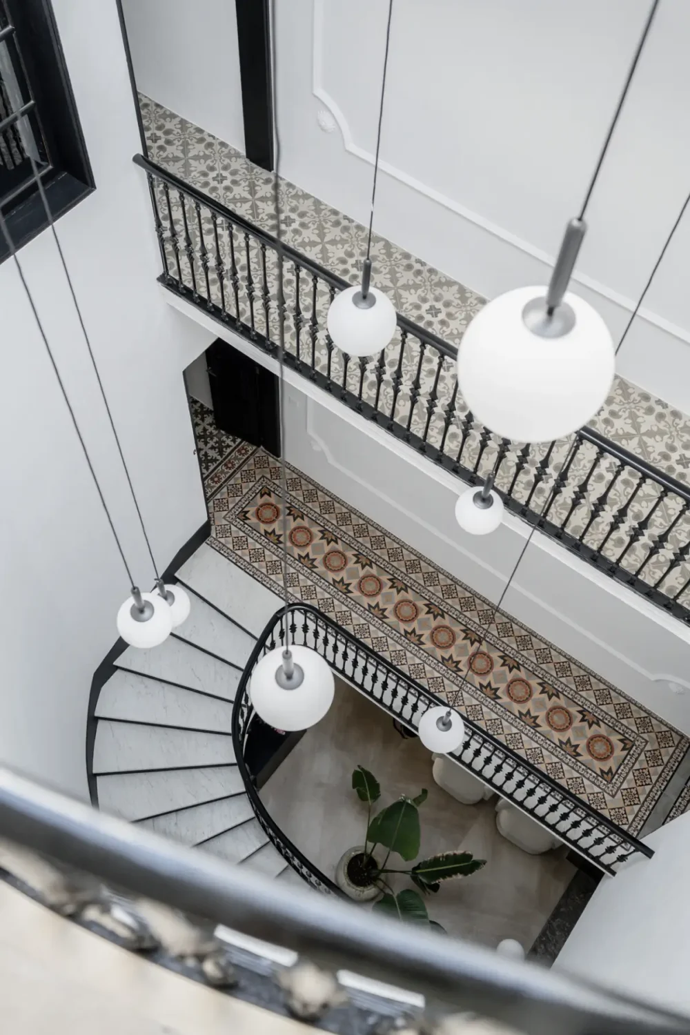A 19th-Century Mallorcan Townhouse Restored by &TEMPEL 9 Palazzo-Bartomeu-stairs-and-tiles-nordroom