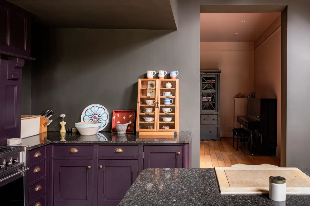 A Dramatic Color Palette in a Large Victorian Family Townhouse 12 aubergine kitchen cabinets