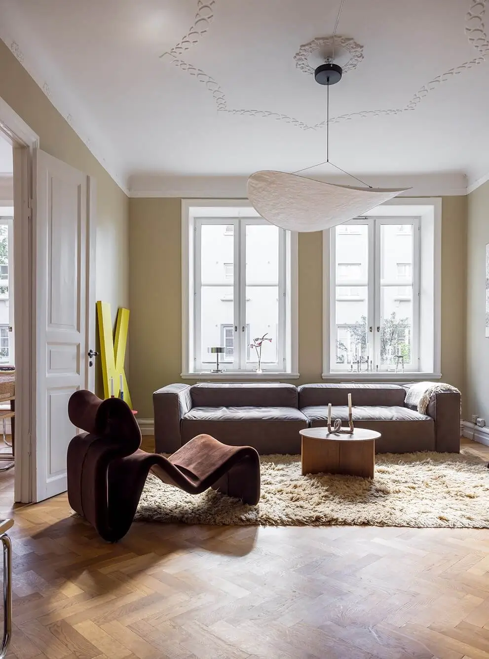 Exposed Brick and Bright Color Pops in a Malmö Apartment
