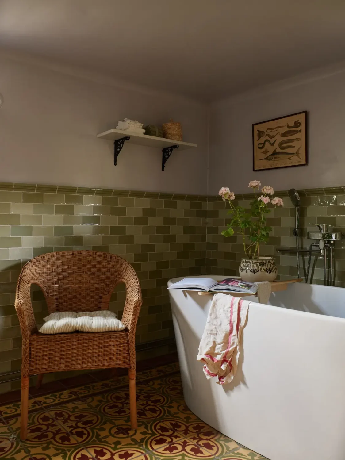 A Well-Preserved 1920s House with a Green Kitchen in Stockholm 26 basement bathroom freestanding bath green tiles