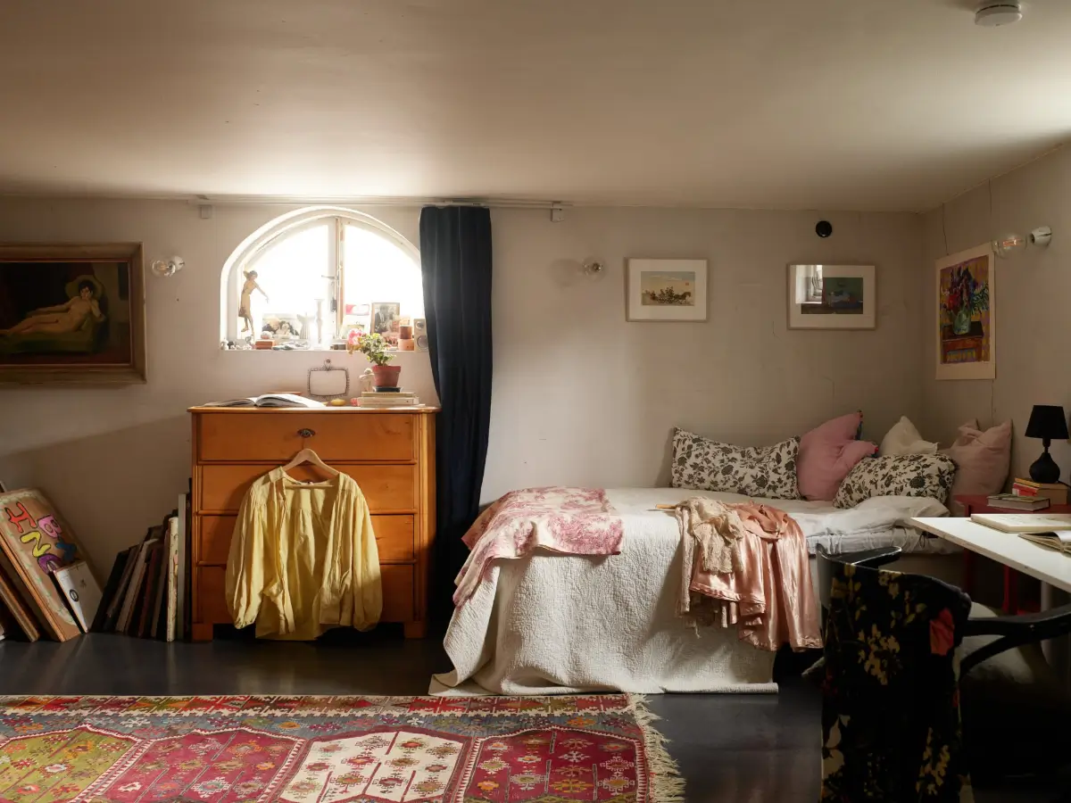 A Well-Preserved 1920s House with a Green Kitchen in Stockholm 31 basement bedroom