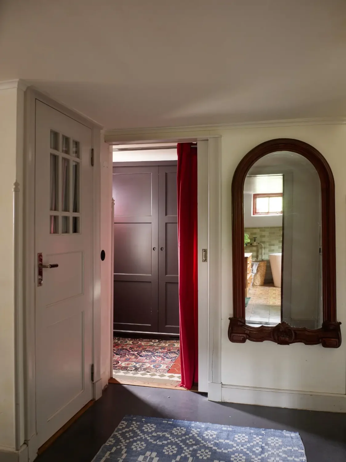 A Well-Preserved 1920s House with a Green Kitchen in Stockholm 36 basement hall