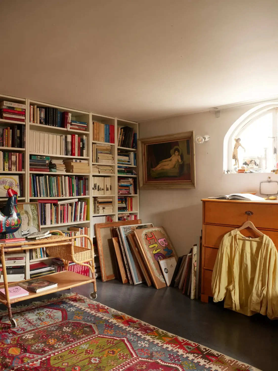 A Well-Preserved 1920s House with a Green Kitchen in Stockholm 34 basement library room