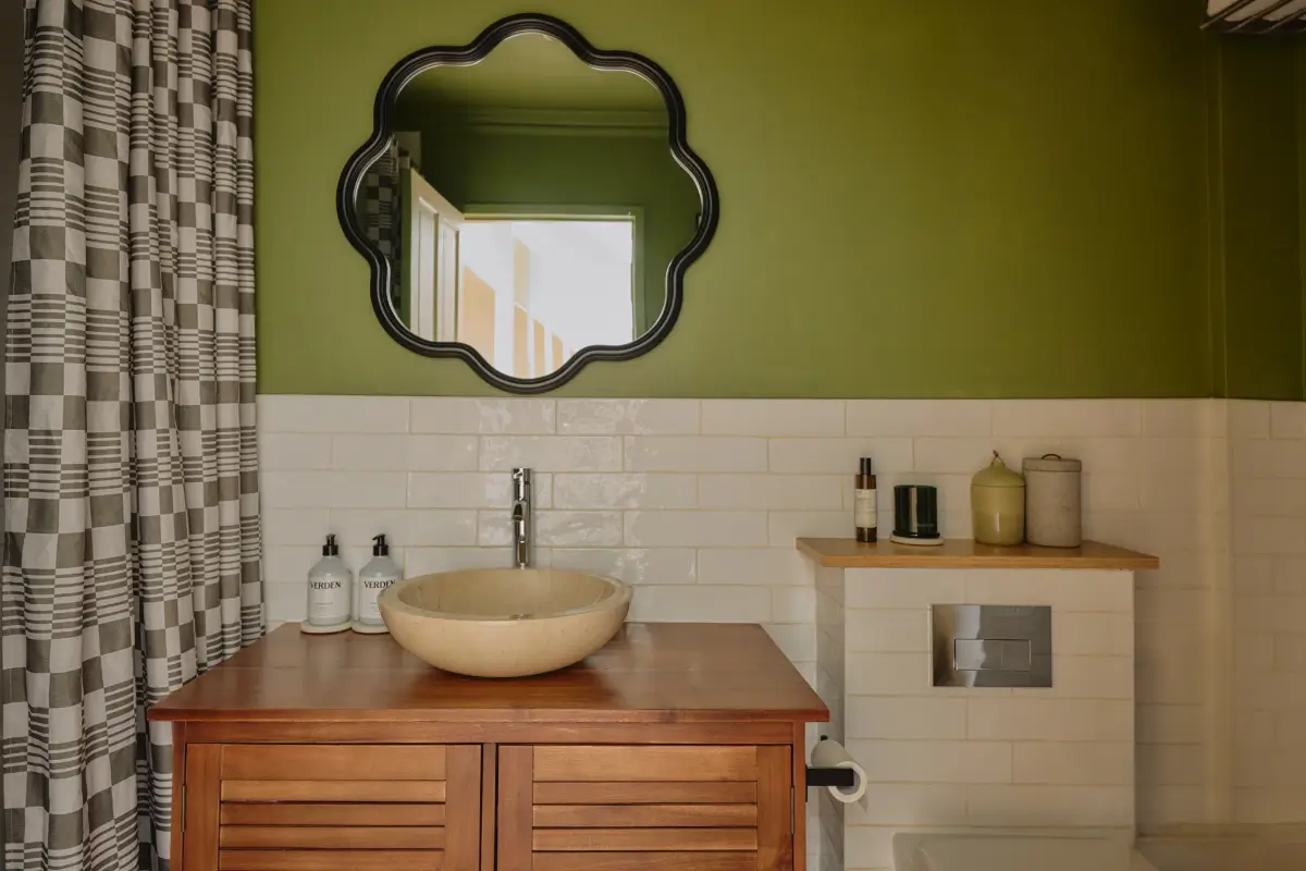 Modern Craftsmanship and Historic Charm in a London Home 25 bathroom green walls white tiles