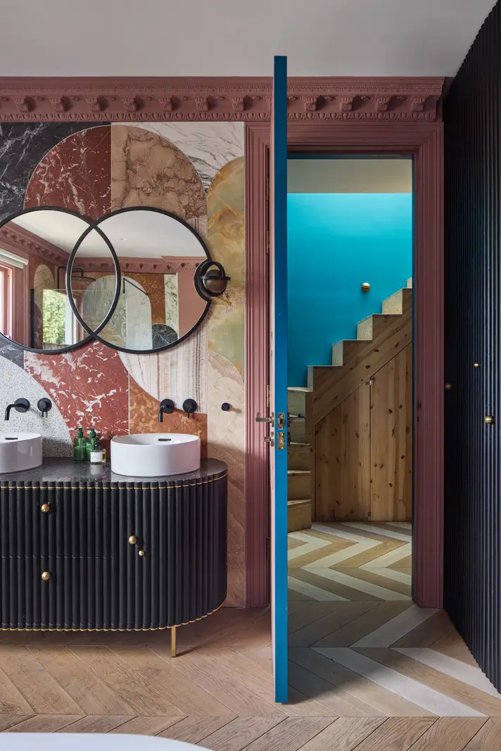 Victorian Grandeur Meets Modern Design in a Camden Square Townhouse 19 bathroom marble wall pattern double sinks chevron floor