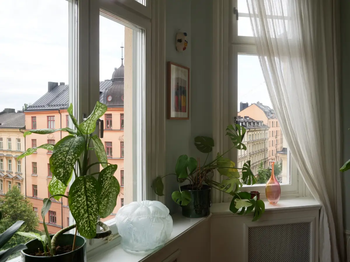 A Spacious Family Apartment with Original Details in Stockholm 5 bay window view
