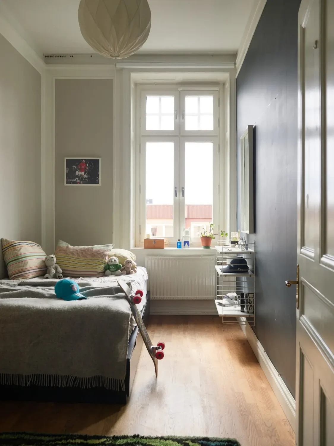 A Spacious Family Apartment with Original Details in Stockholm 25 bedroom light gray and dark blue walls