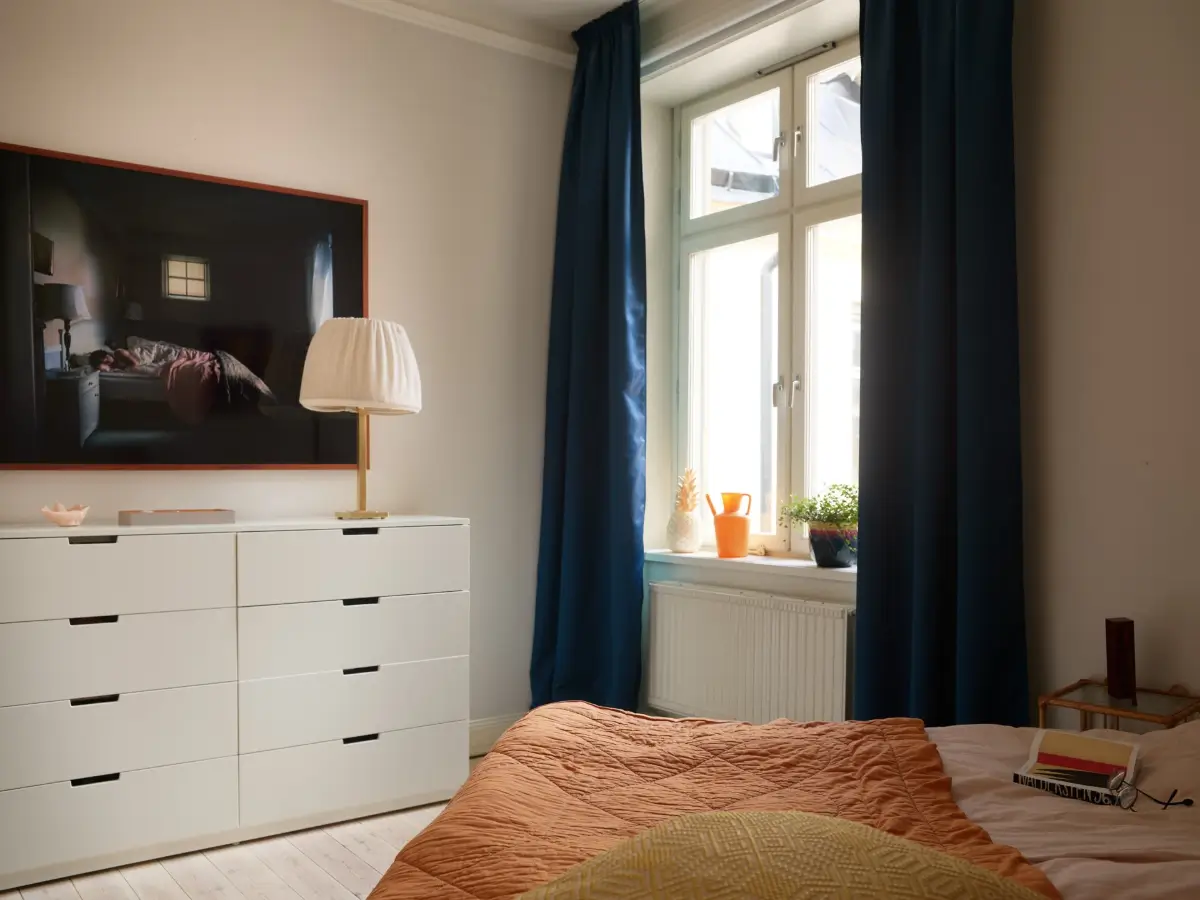 A Spacious Family Apartment with Original Details in Stockholm 24 bedroom velvet blue curtains