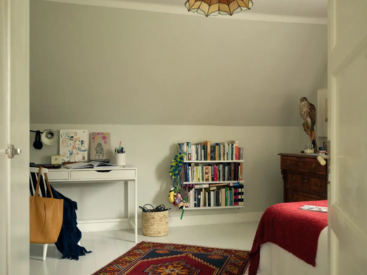 A Cheerful Color Palette in an Early 20th Century Villa in Stockholm 28 bedroom white floorboards ikea desk