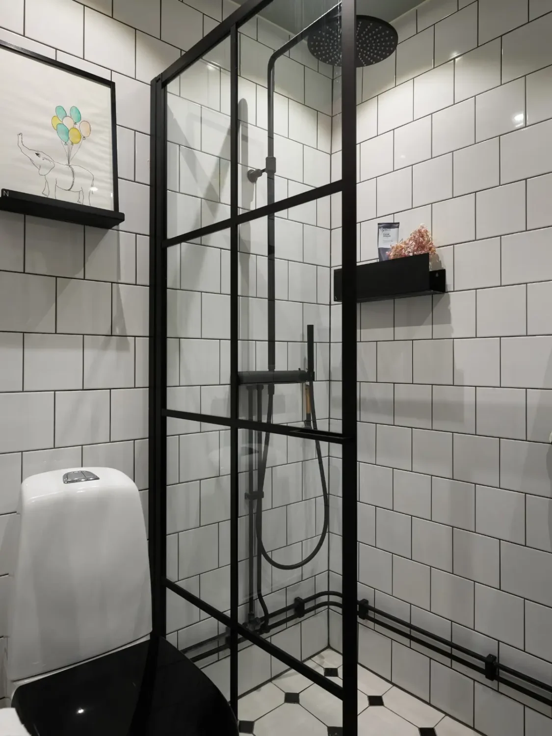 Midcentury Furniture & a Dark Blue Bedroom in a 1930s Apartment 16 black and white industrial-style bathroom nordroom