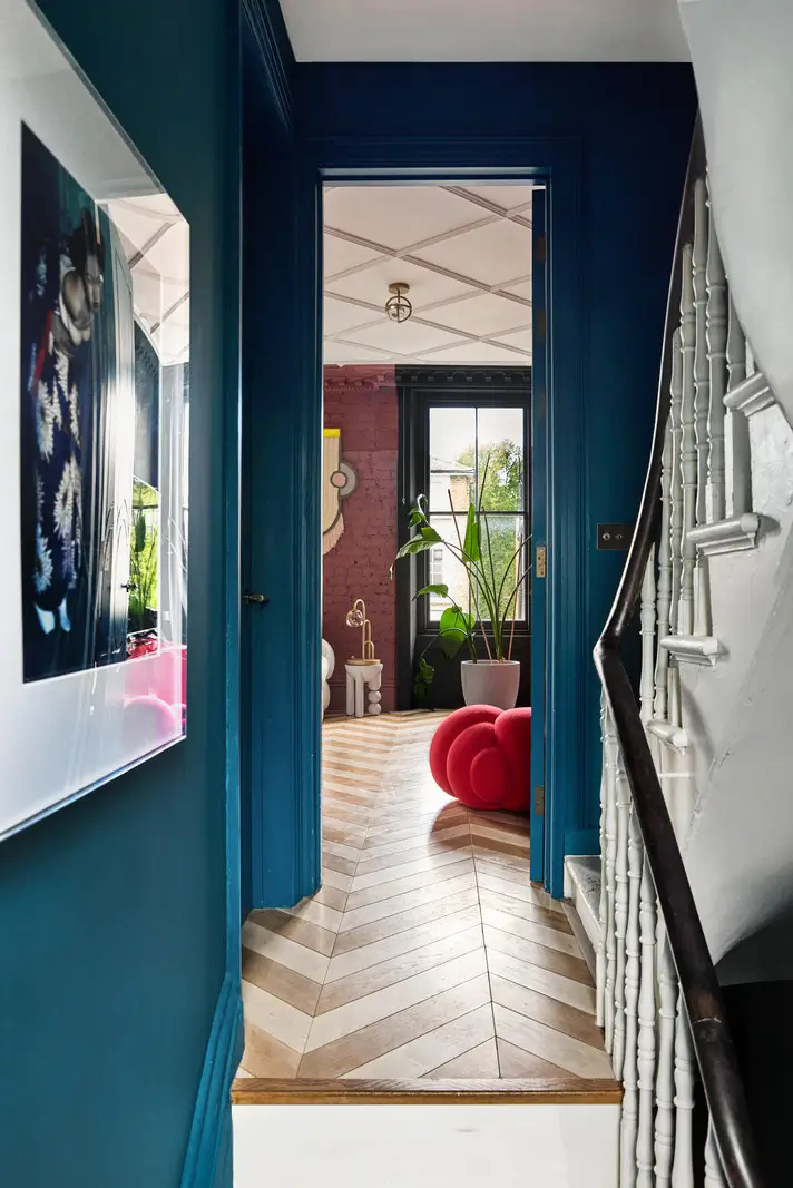 Victorian Grandeur Meets Modern Design in a Camden Square Townhouse 14 blue hallway