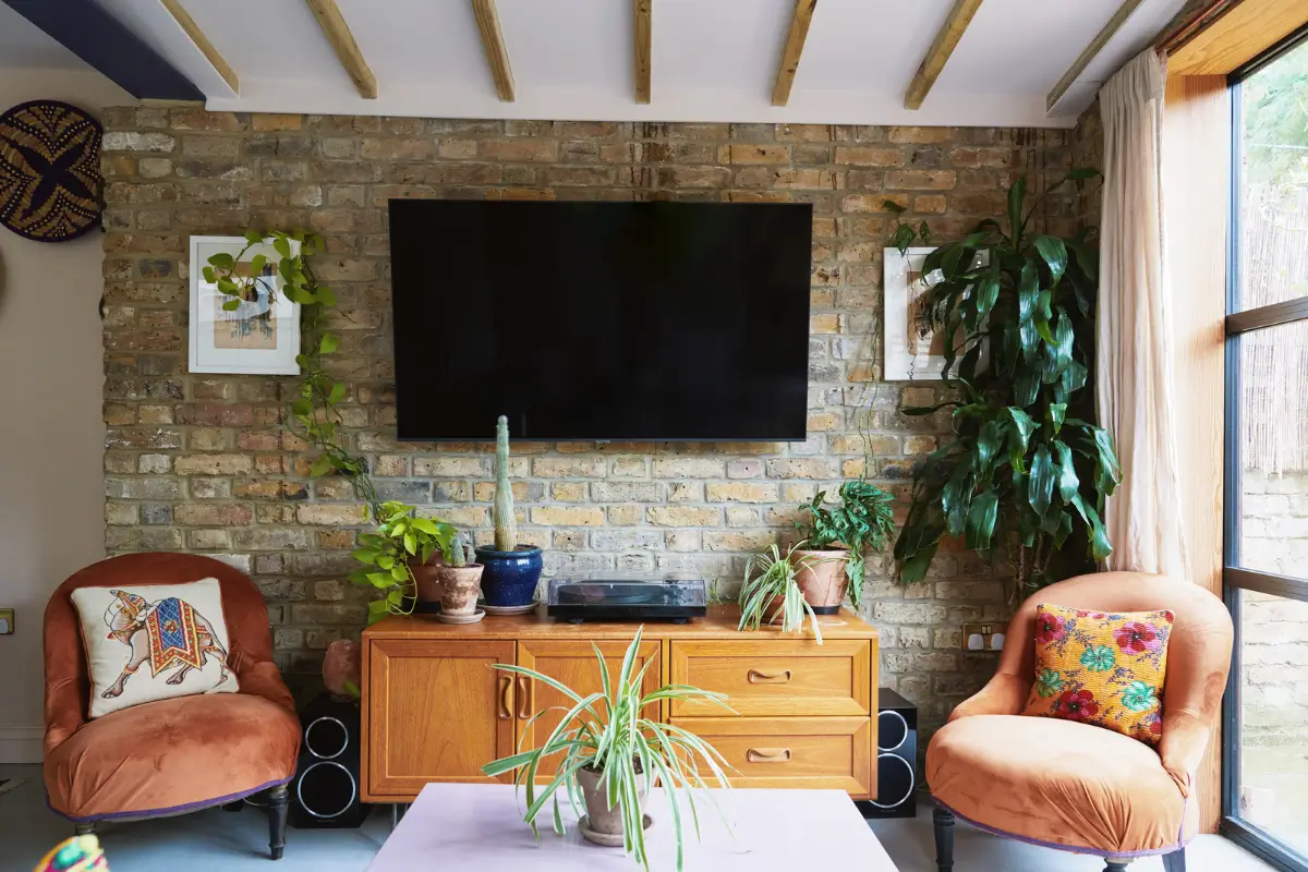 An Extended Victorian Apartment with Exposed Brick Walls 3 brick wall living room