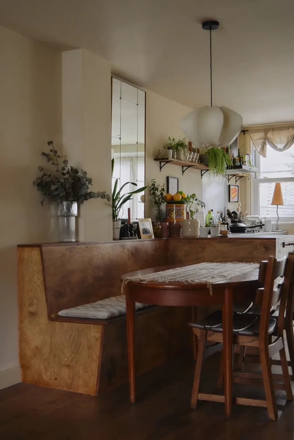 Modern Craftsmanship and Historic Charm in a London Home 14 built-in dining bench