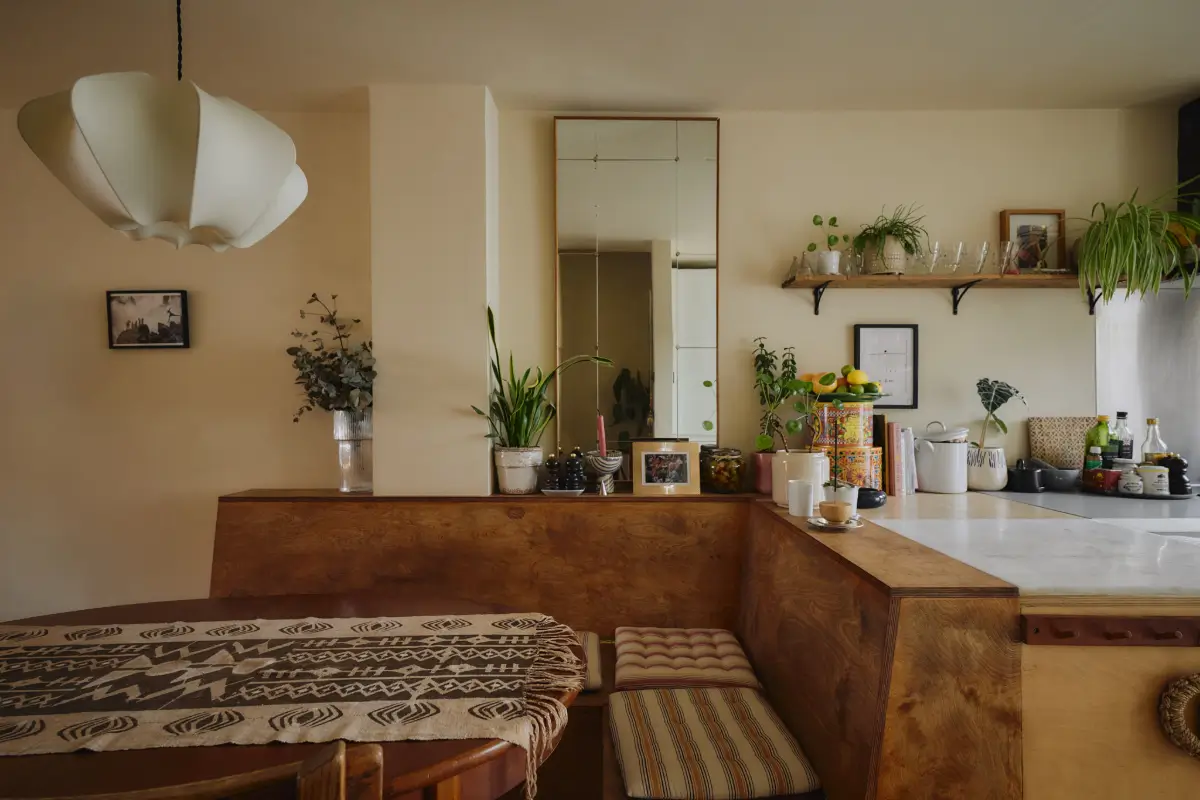 Modern Craftsmanship and Historic Charm in a London Home 6 built-in seating dining table