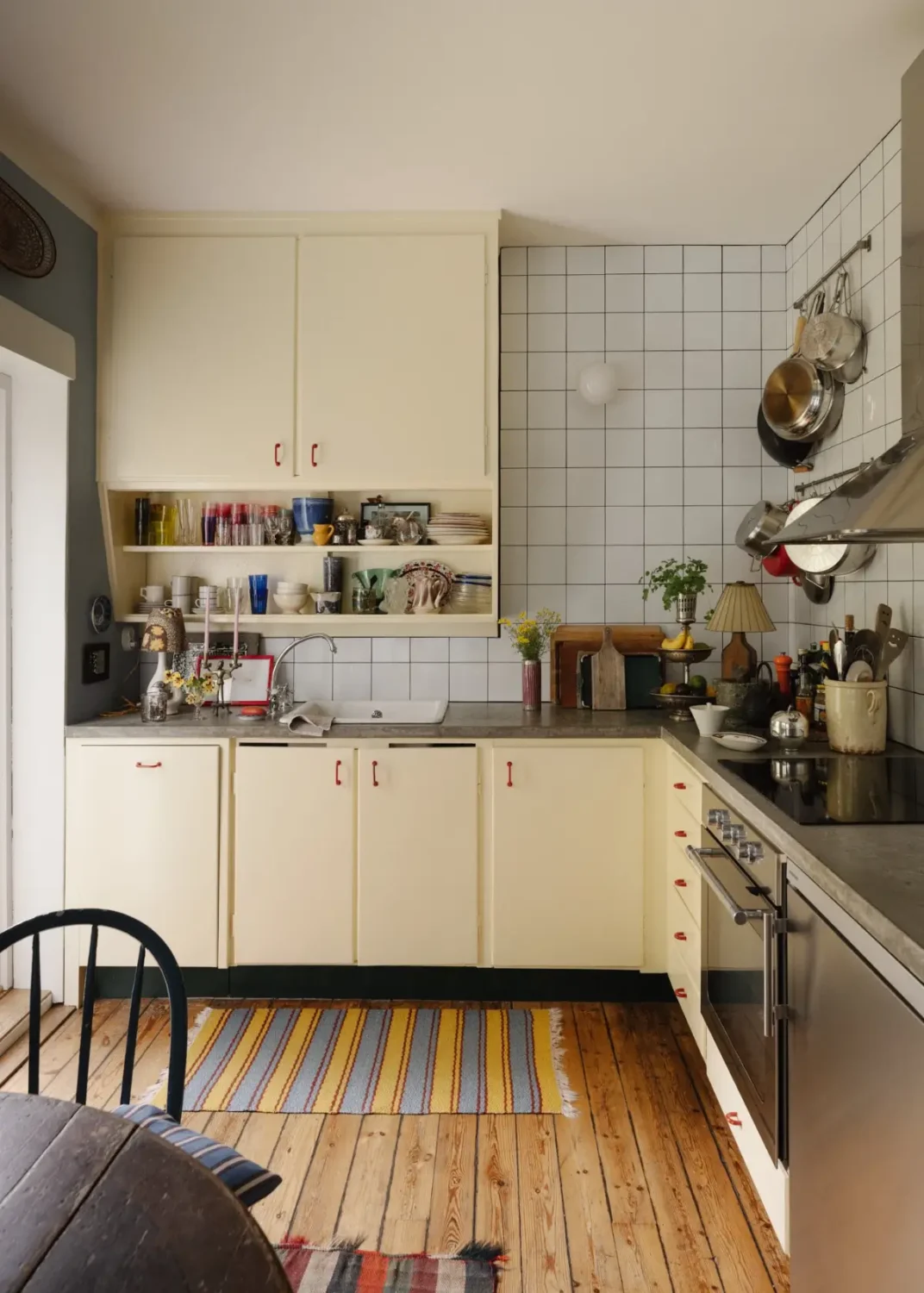 Best of 2025: Studio & Loft Apartments 15 butter yellow kitchen concrete worktop