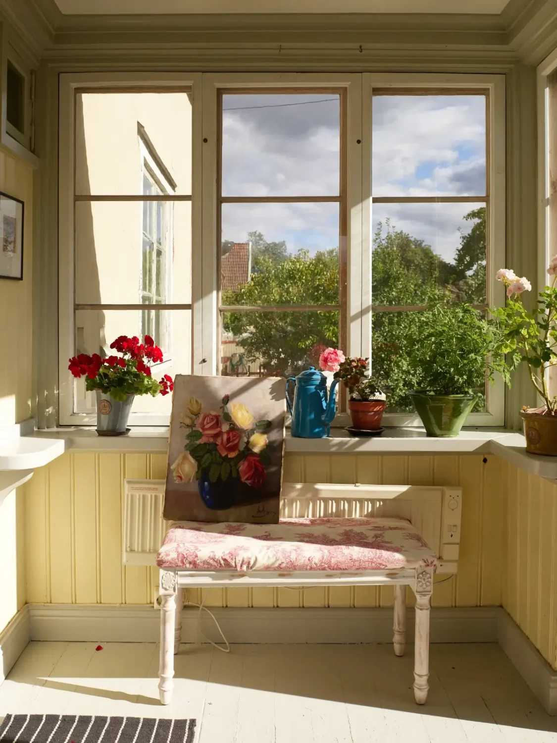 A Well-Preserved 1920s House with a Green Kitchen in Stockholm 39 butter yellow veranda