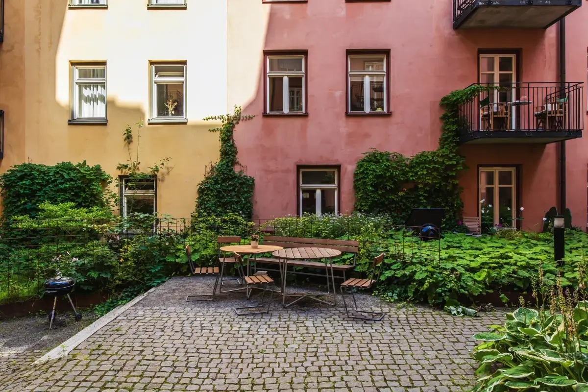 Warm Colors and an Open-Plan Living Space in a Stockholm Apartment 16 communal courtyard Warm Colors and an Open-Plan Living Space in a Stockholm Apartment