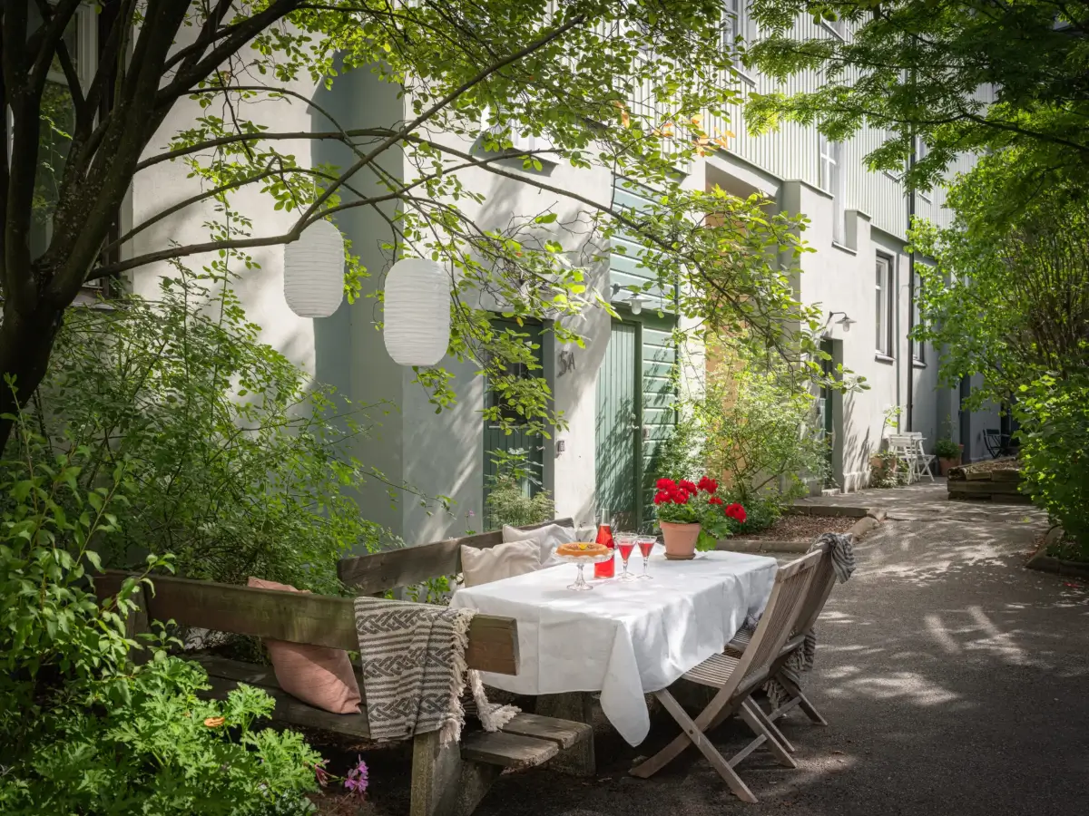 A Cozy Apartment with Exposed Brick and Period Details 32 communal garden table