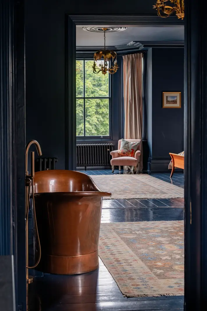 A Dramatic Color Palette in a Large Victorian Family Townhouse 21 copper bath