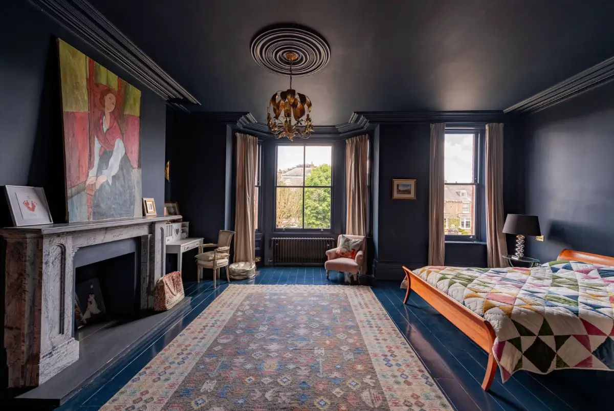 A Dramatic Color Palette in a Large Victorian Family Townhouse 17 dark blue master suite bay window