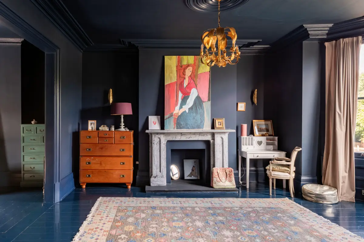 A Dramatic Color Palette in a Large Victorian Family Townhouse 18 dark blue master suite marble fireplace