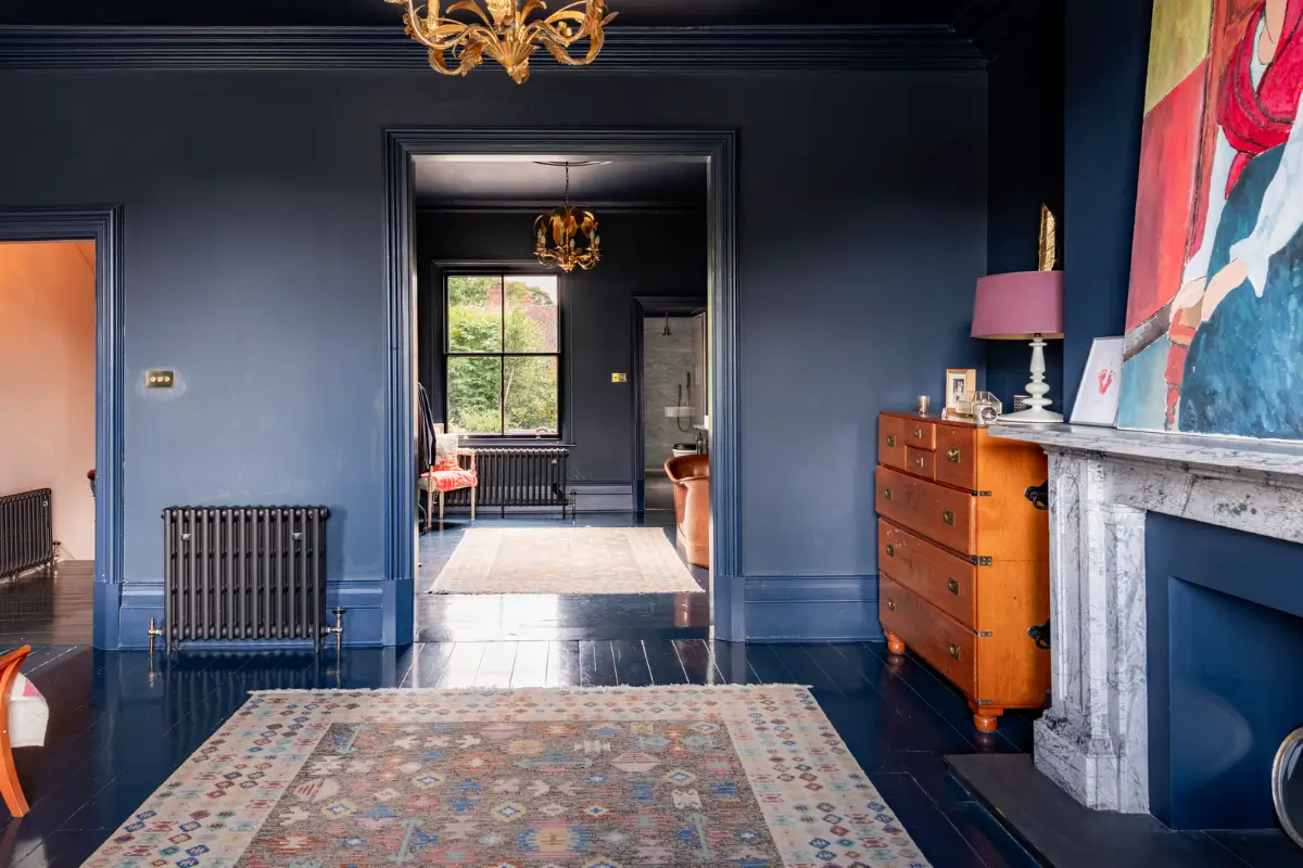 A Dramatic Color Palette in a Large Victorian Family Townhouse 19 dark blue master suite