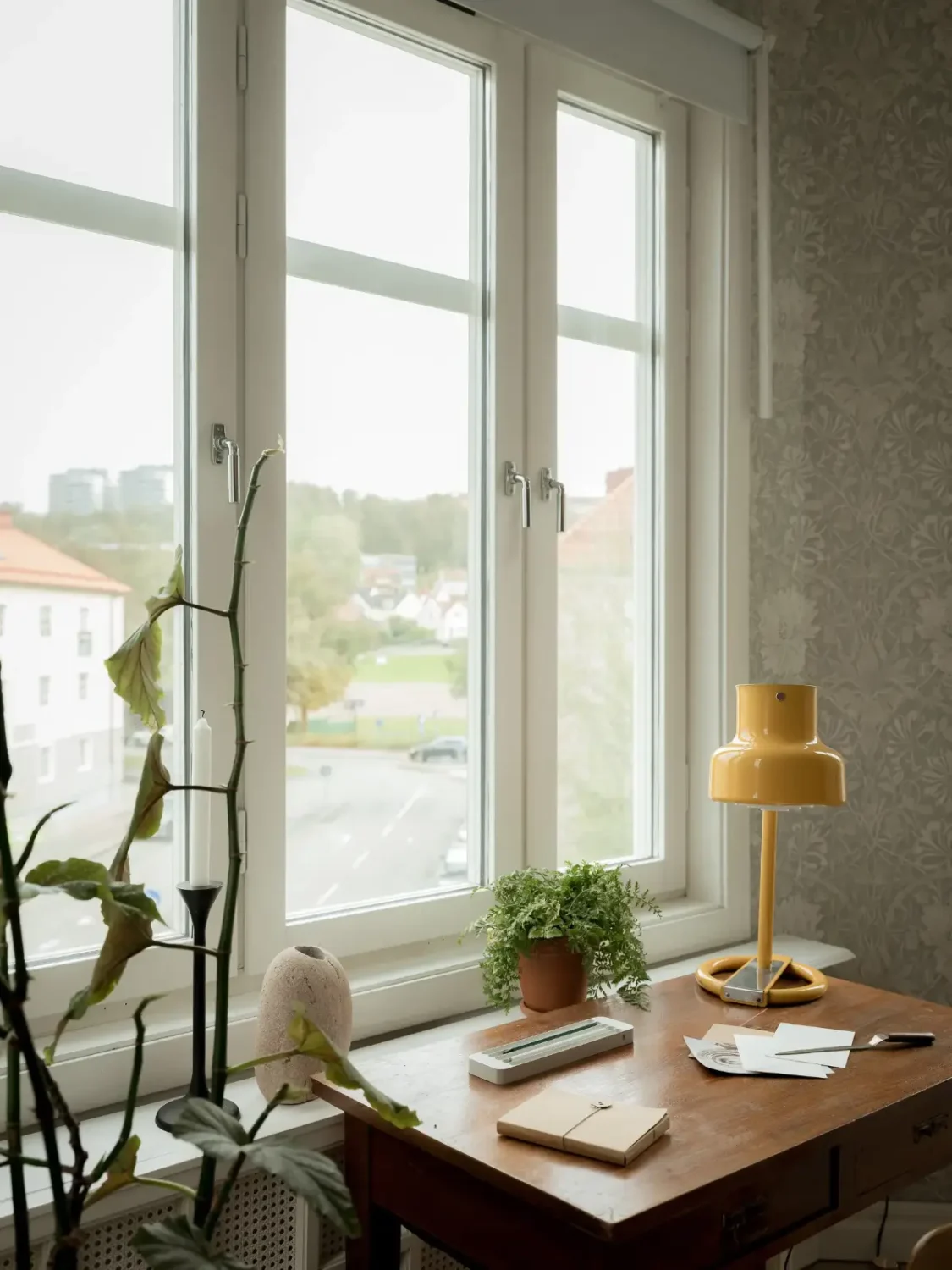 A Cozy Apartment with Exposed Brick and Period Details 12 desk under window