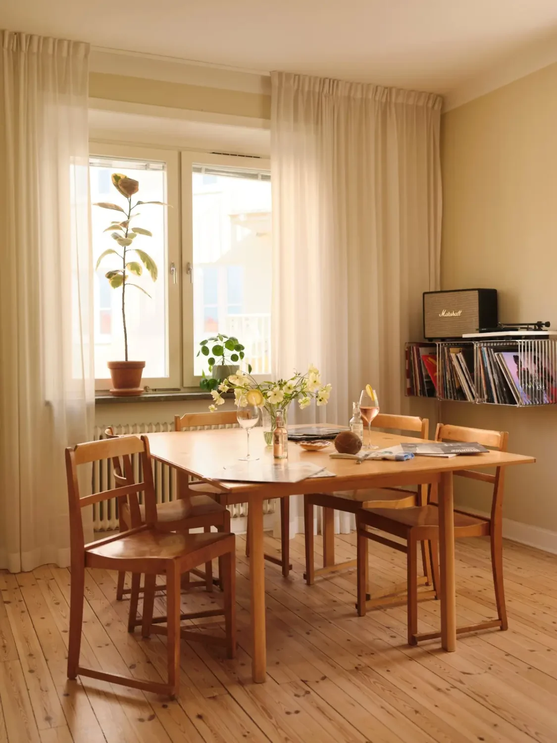 Soft Beige Interiors with the Occasional Bright Color Pop in Stockholm 2 dining table