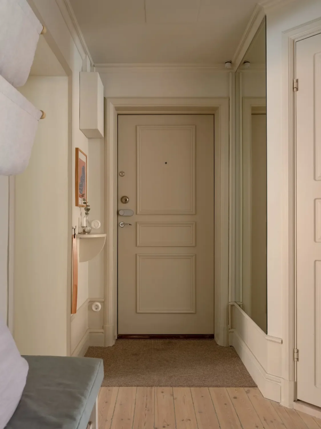 A Light Color Palette and a Charming Private Patio in a Stockholm Apartment 31 entry hall A Light Color Palette and a Charming Private Patio in a Stockholm Apartment