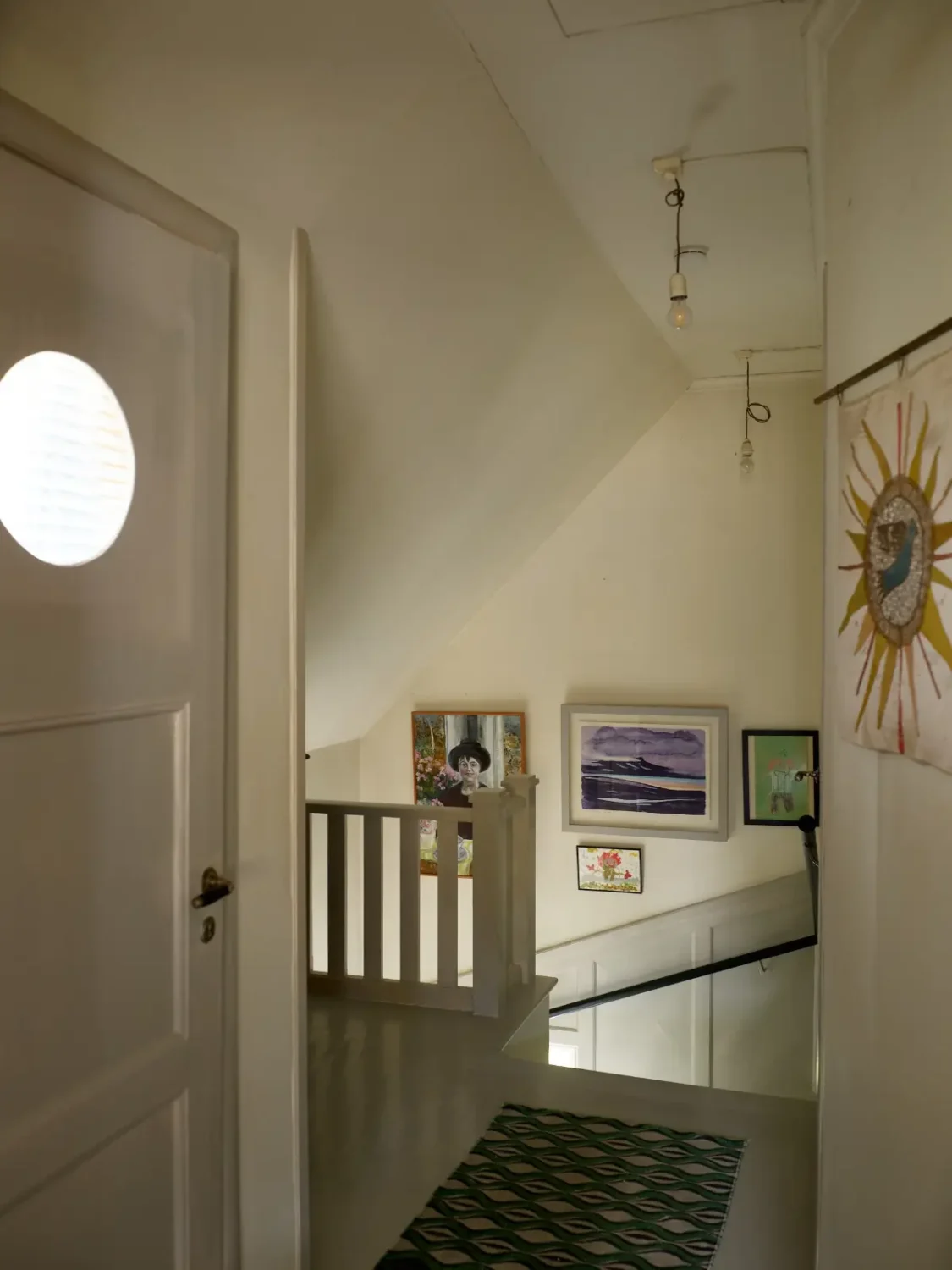 A Well-Preserved 1920s House with a Green Kitchen in Stockholm 16 first floor stairs