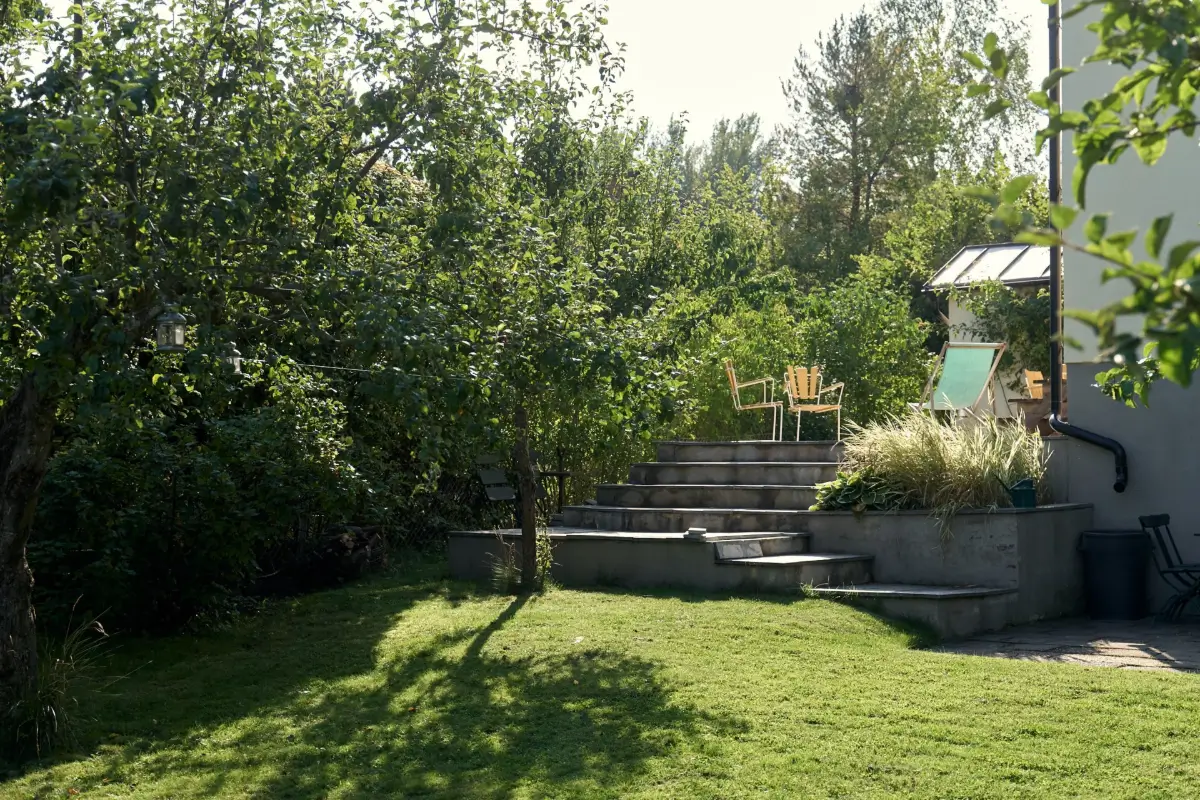 A Cheerful Color Palette in an Early 20th Century Villa in Stockholm 37 garden raised terrace