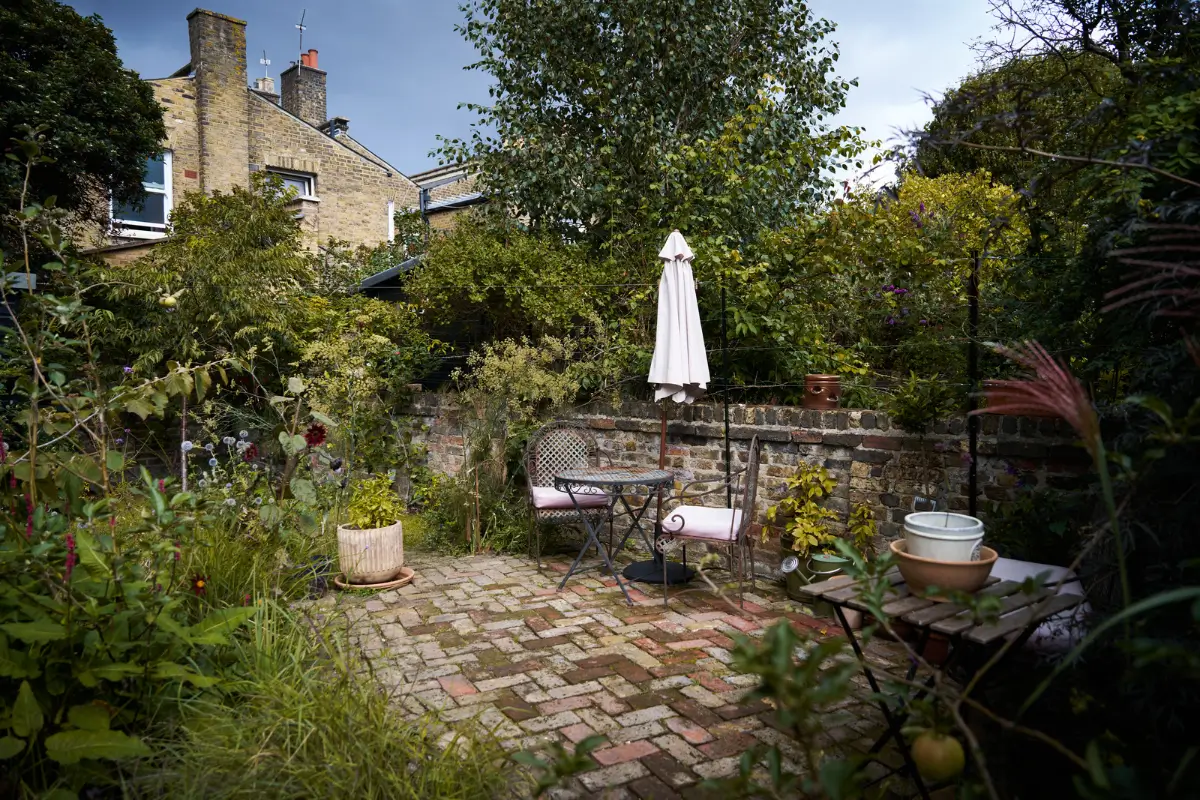 Restored Features in a Charming Georgian Apartment in London 20 garden terrace