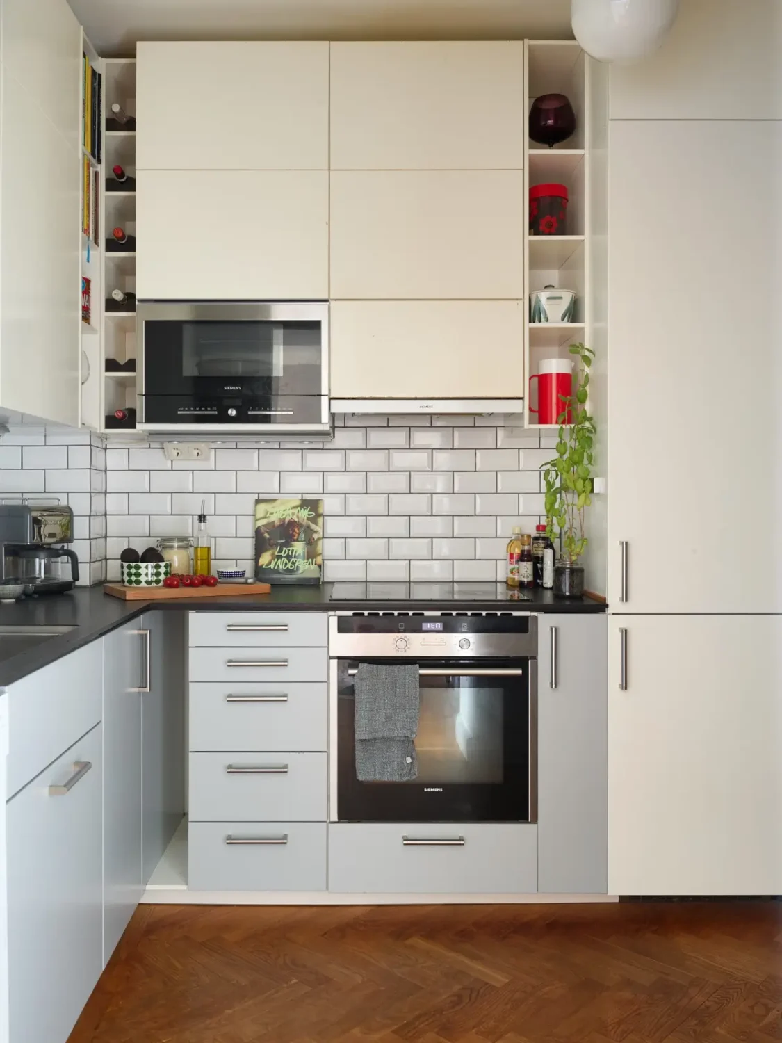 Midcentury Furniture & a Dark Blue Bedroom in a 1930s Apartment 13 gray and white kitchen