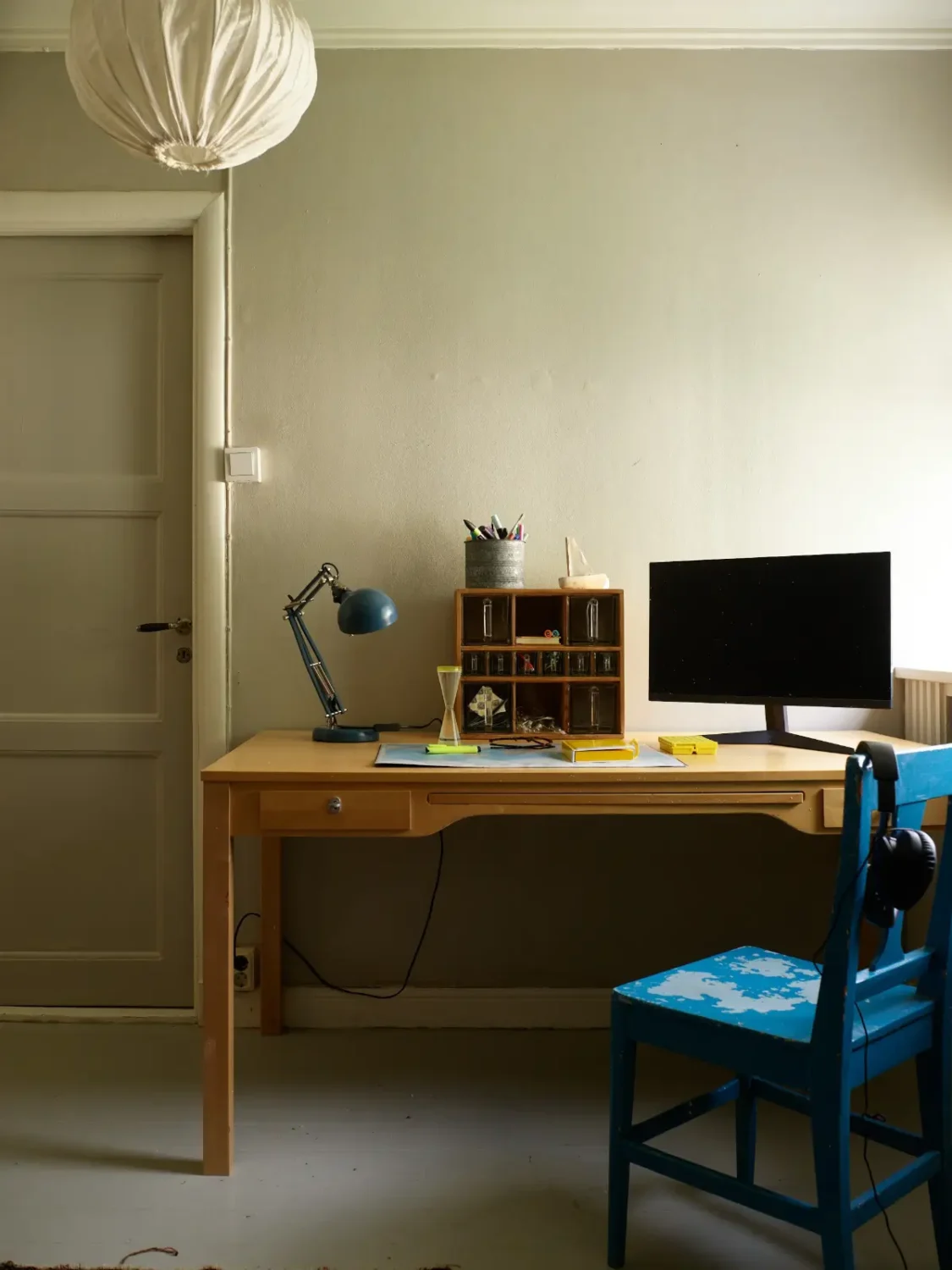 A Well-Preserved 1920s House with a Green Kitchen in Stockholm 21 gray bedroom desk