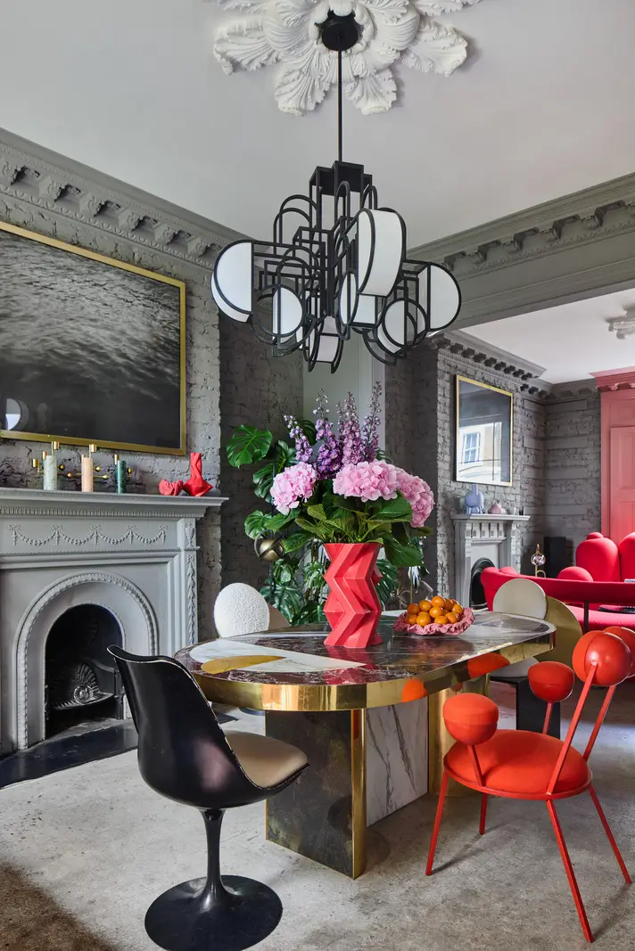 Victorian Grandeur Meets Modern Design in a Camden Square Townhouse 7 gray dining room colorful furniture