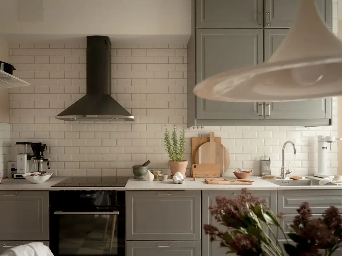 A Cozy Apartment with Exposed Brick and Period Details 18 gray scandi kitchen white backsplash tiles