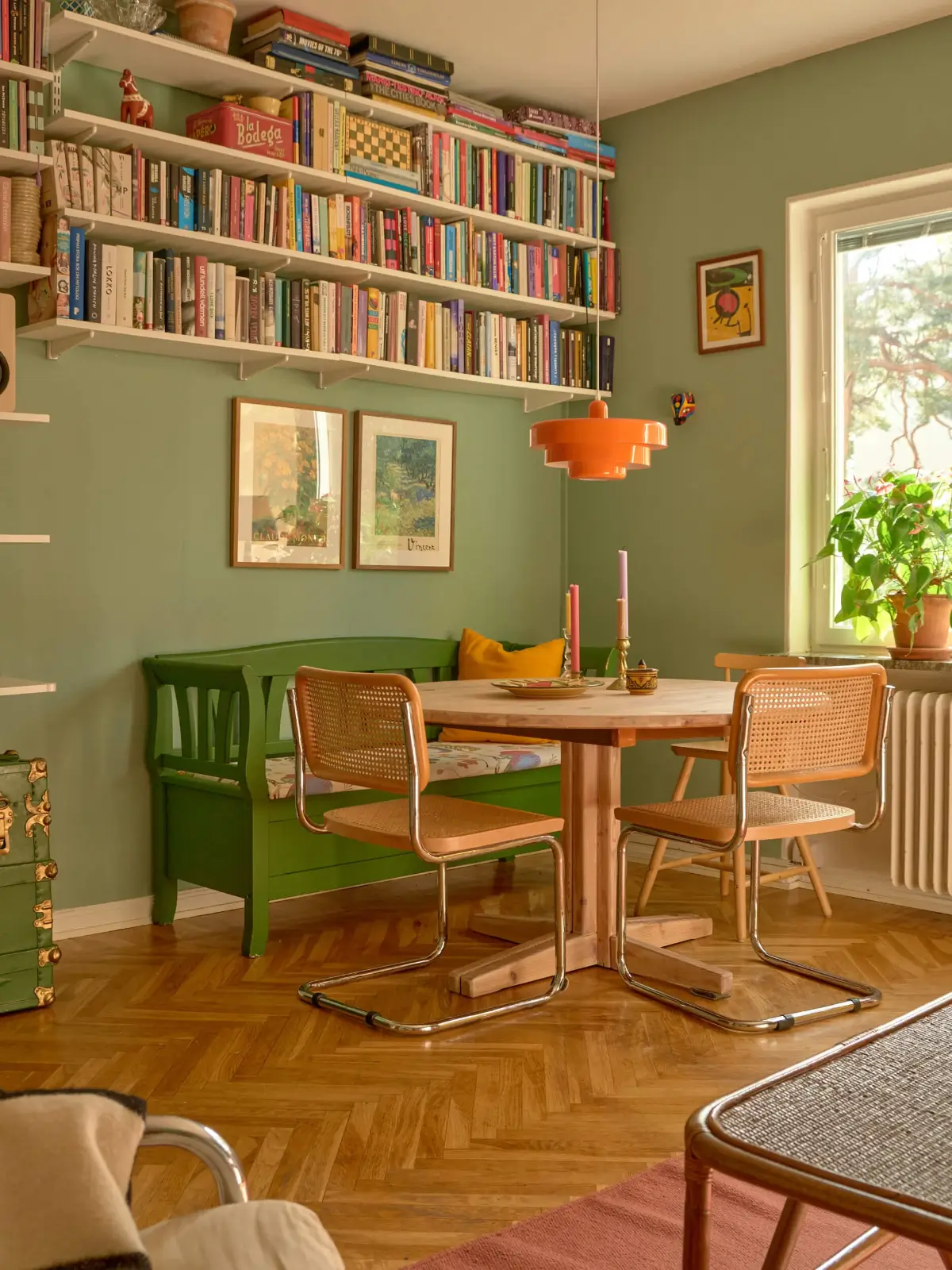 green living room round wooden floor bookshelves nordroom