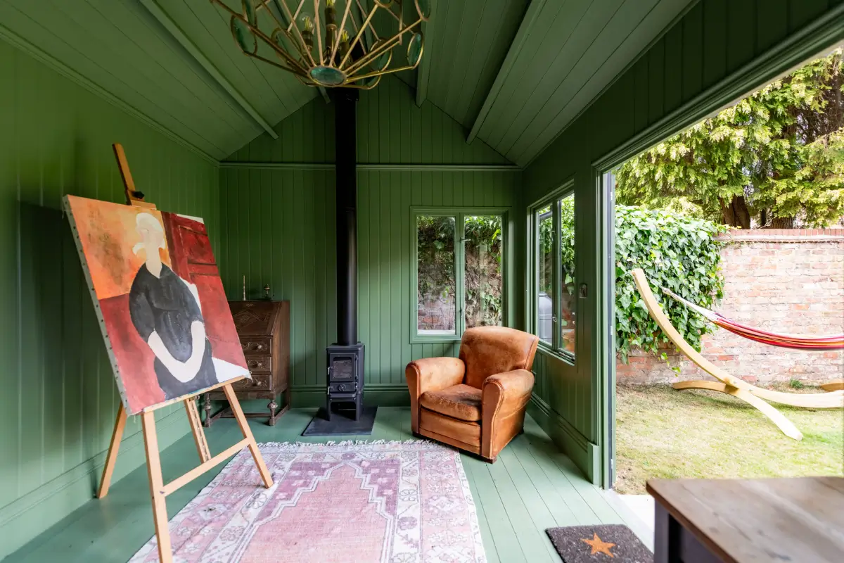 A Dramatic Color Palette in a Large Victorian Family Townhouse 38 green paneled garden shed