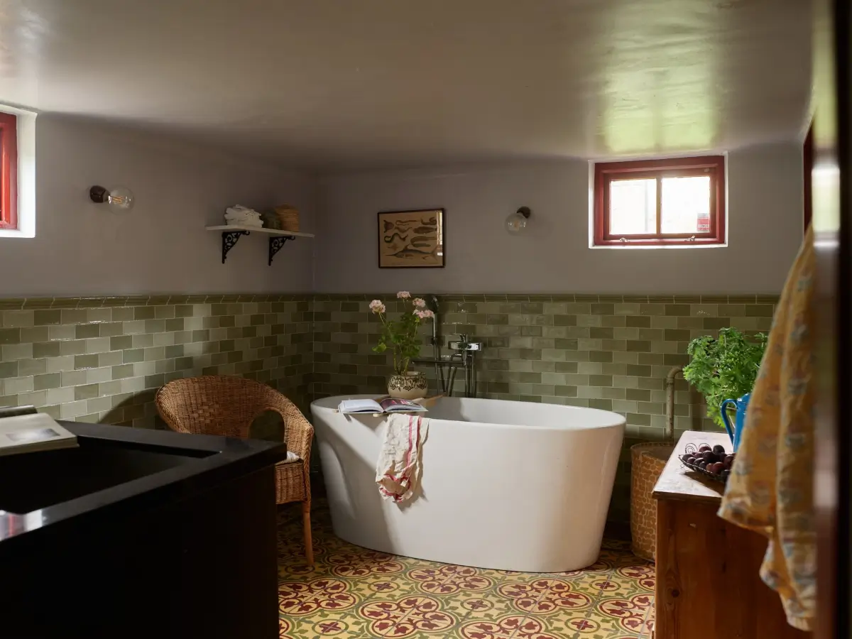A Well-Preserved 1920s House with a Green Kitchen in Stockholm 25 green tiles basement bathroom
