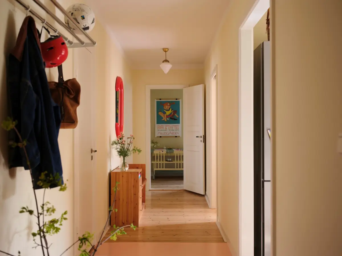 Soft Beige Interiors with the Occasional Bright Color Pop in Stockholm 23 hall beige-yellow walls