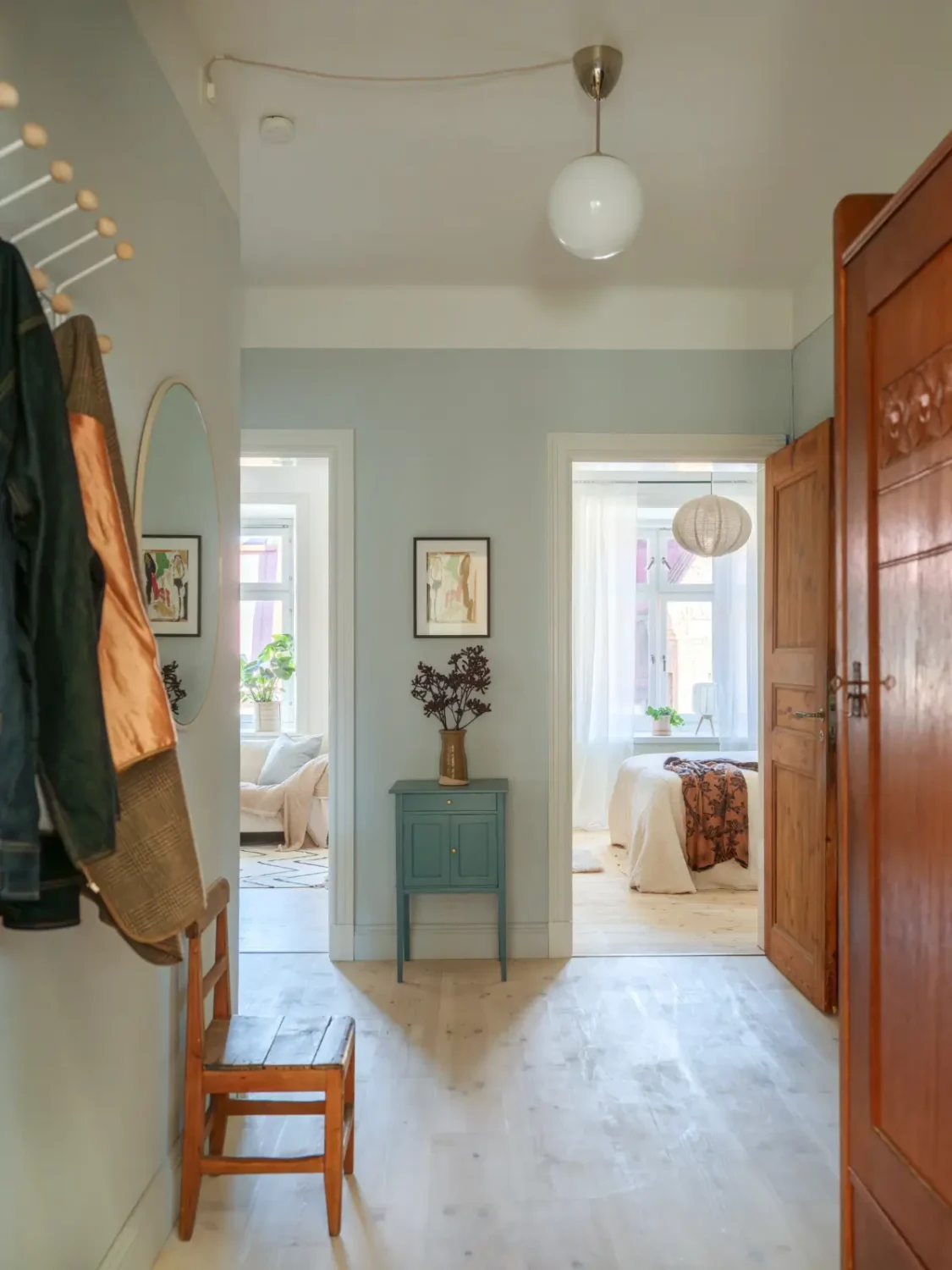 A Bright Apartment Where Historic Character Meets Contemporary Design 30 hall light blue walls