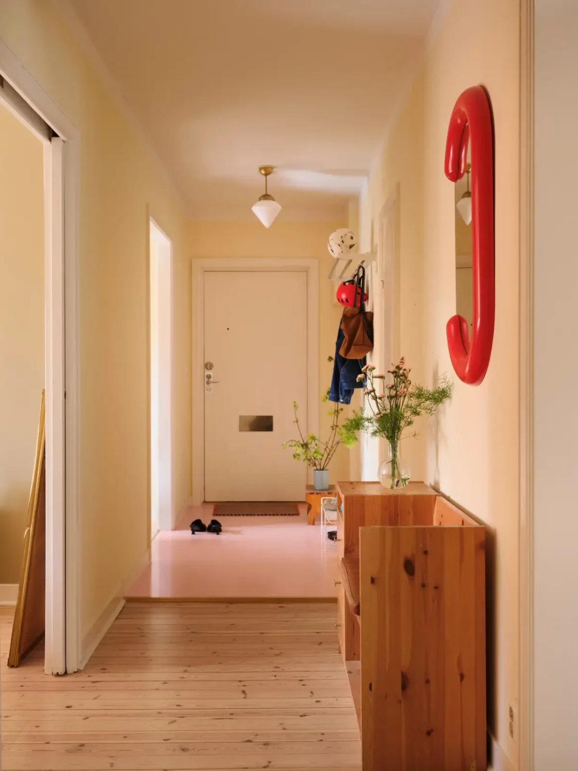 Soft Beige Interiors with the Occasional Bright Color Pop in Stockholm 29 hall pale yellow walls