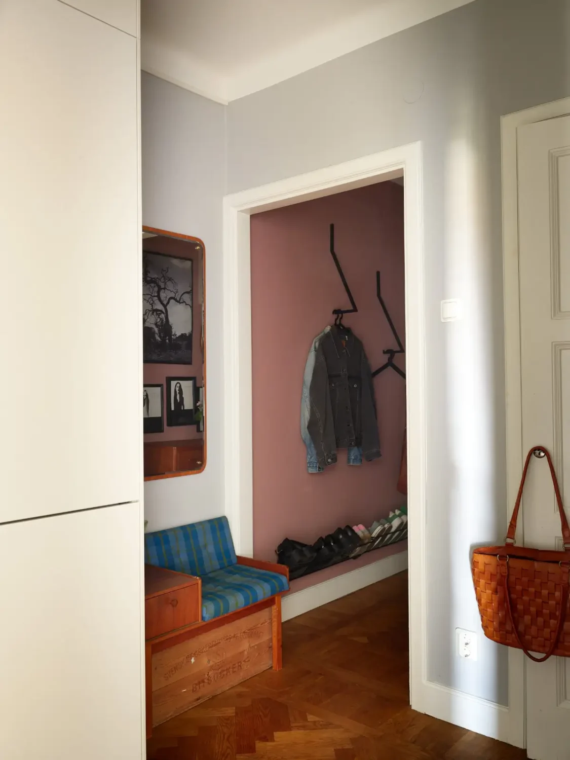 Midcentury Furniture & a Dark Blue Bedroom in a 1930s Apartment 14 hall parquet floor