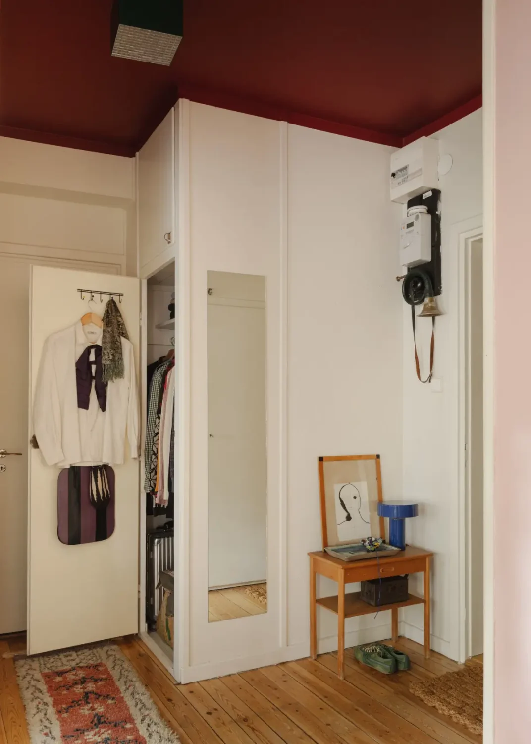 A Pink 1930s Studio Apartment with a Lovely Private Garden 28 hall red ceiling