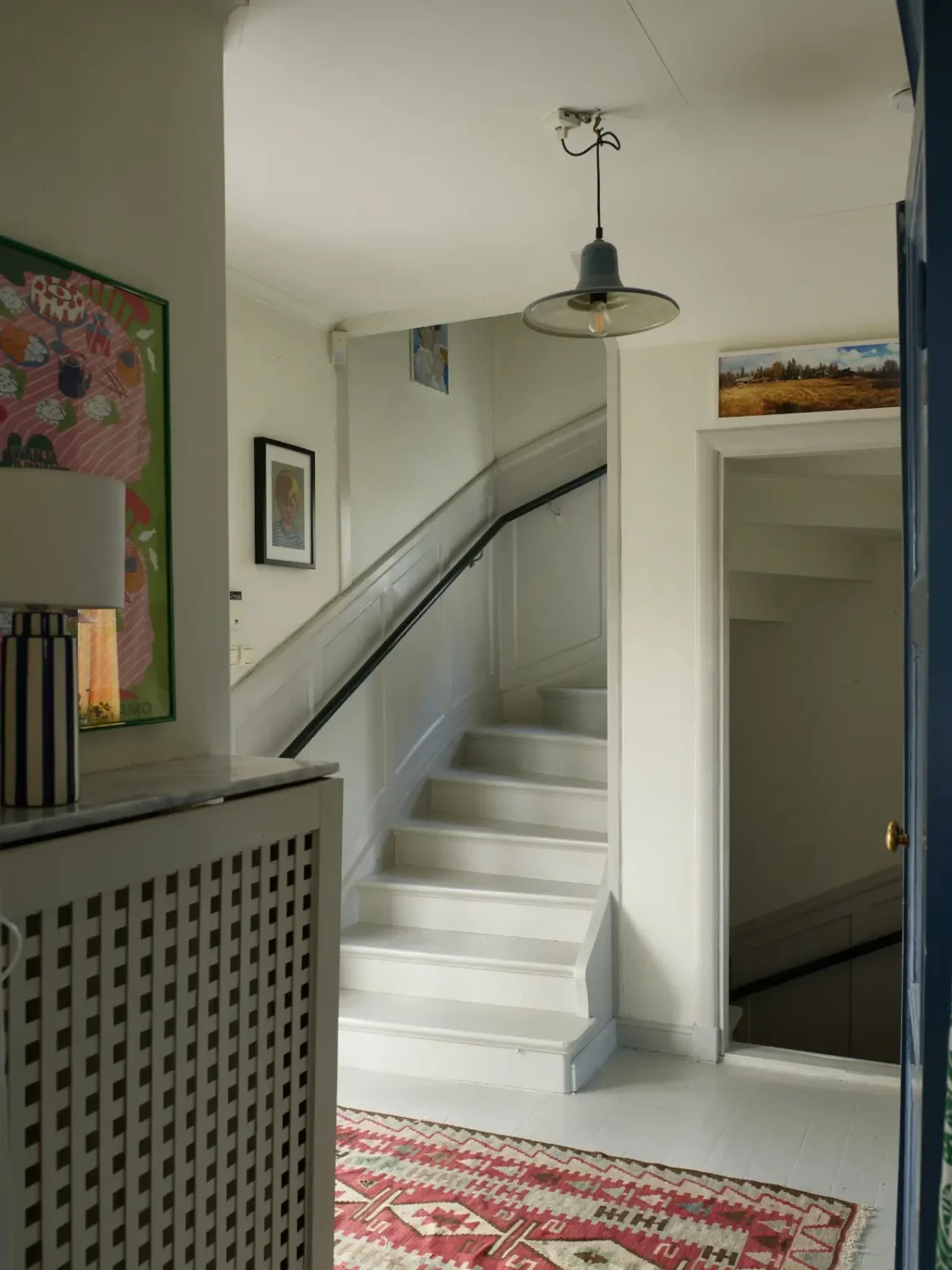 A Well-Preserved 1920s House with a Green Kitchen in Stockholm 15 hall staircase
