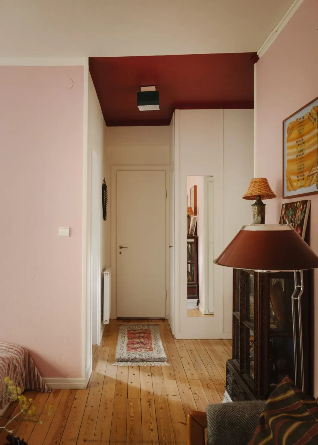 A Pink 1930s Studio Apartment with a Lovely Private Garden 7 hall wooden floor