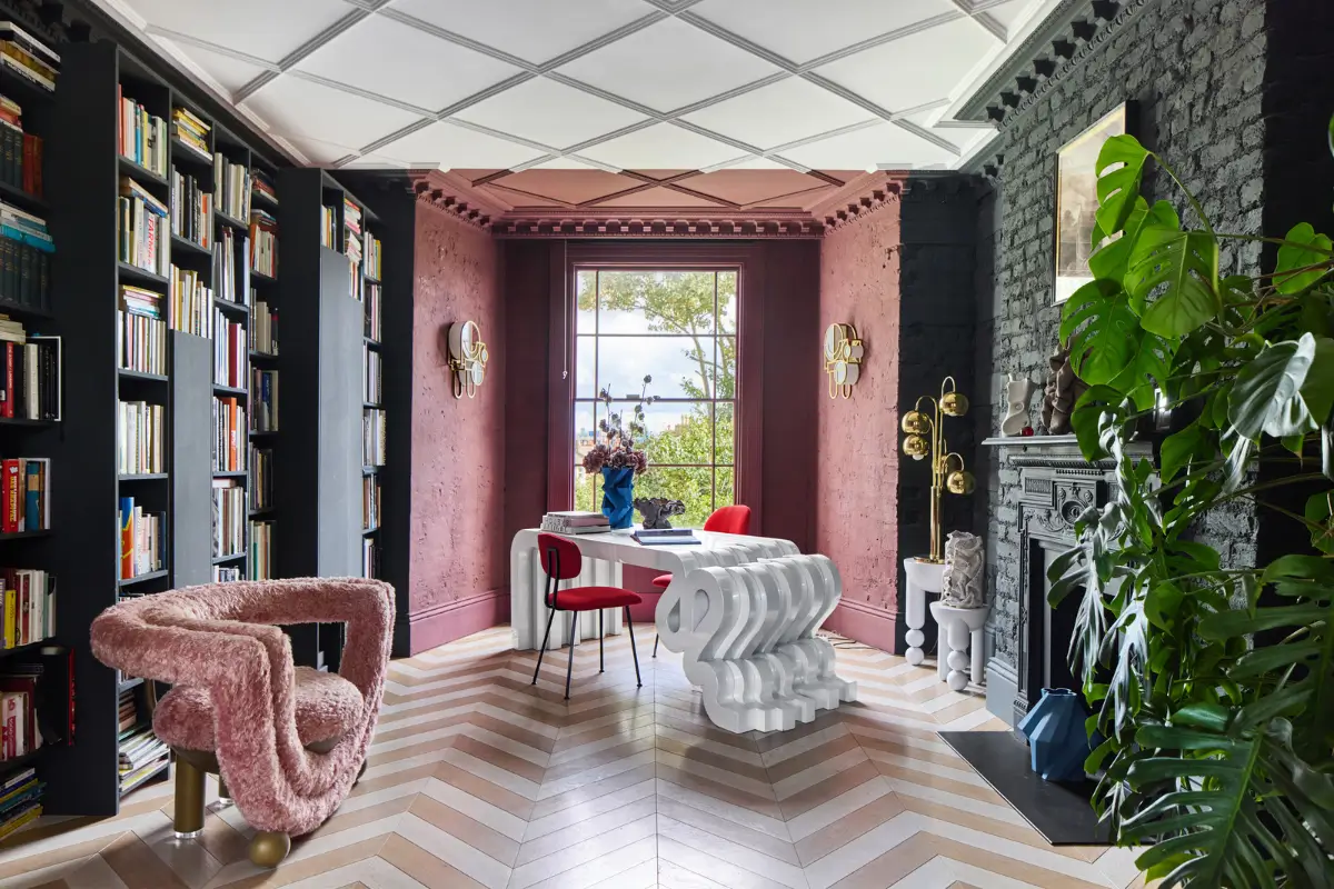 Victorian Grandeur Meets Modern Design in a Camden Square Townhouse 12 home office built-in bookshelves pink and black walls chevron floor nordroom