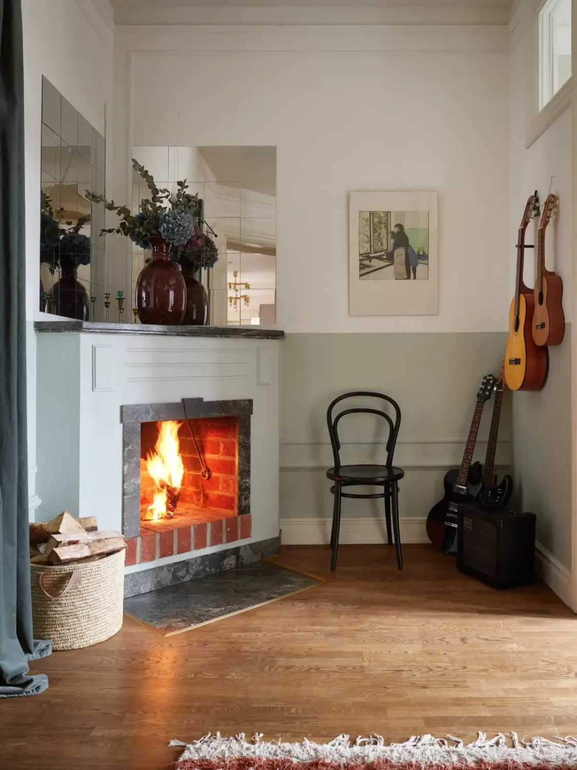 A Spacious Family Apartment with Original Details in Stockholm 10 inner hall half painted walls fireplace