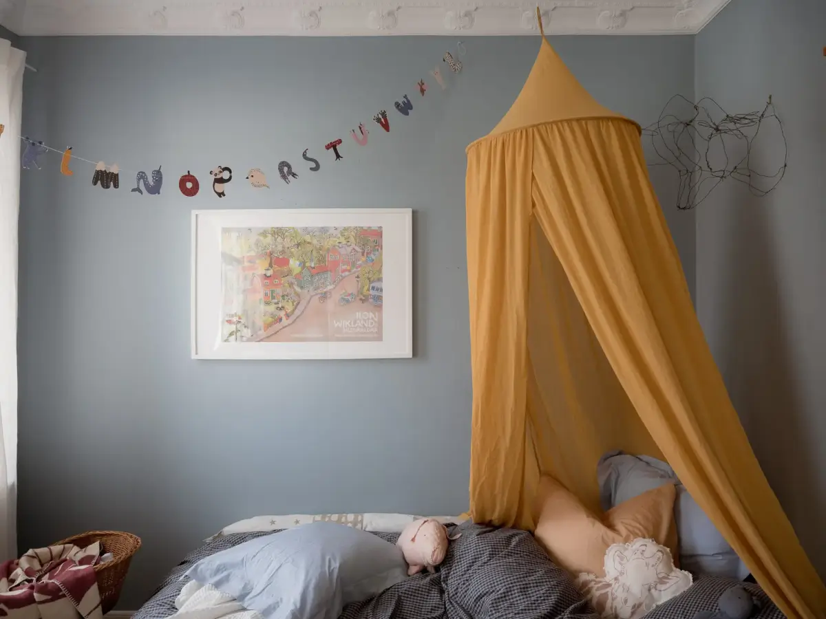 A Cozy Apartment with Exposed Brick and Period Details 26 kids bedroom yellow canopy