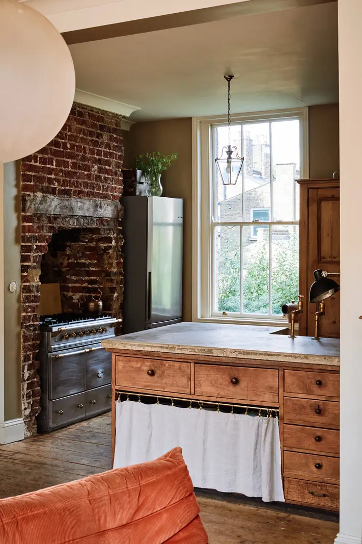 Restored Features in a Charming Georgian Apartment in London 8 kitchen exposed brick chimney breast